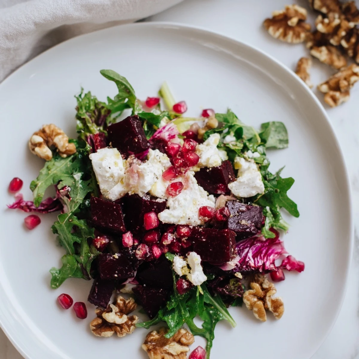 Golden roasted root vegetables tossed with arugula, walnuts, and creamy goat cheese in this Winter Salad Mix. 