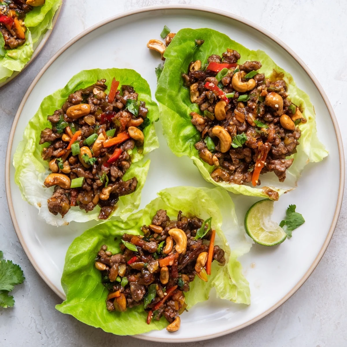 Fresh lettuce cups piled high with savory beef and cashew stir-fry mixture