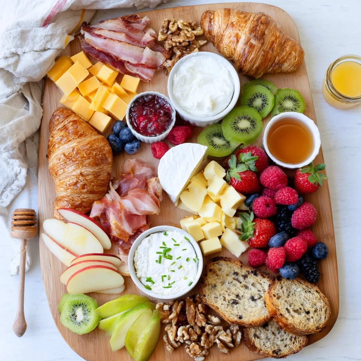 Crowd-pleasing breakfast charcuterie board featuring smoked salmon, brie, boiled eggs, and vibrant fruit for easy morning grazing