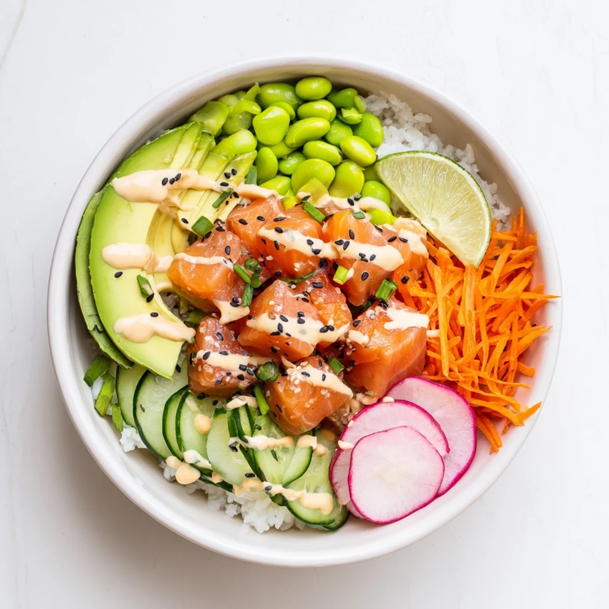 Colorful Hawaiian-inspired salmon and avocado poke bowl featuring cubed raw fish, crisp veggies, and zesty sauces