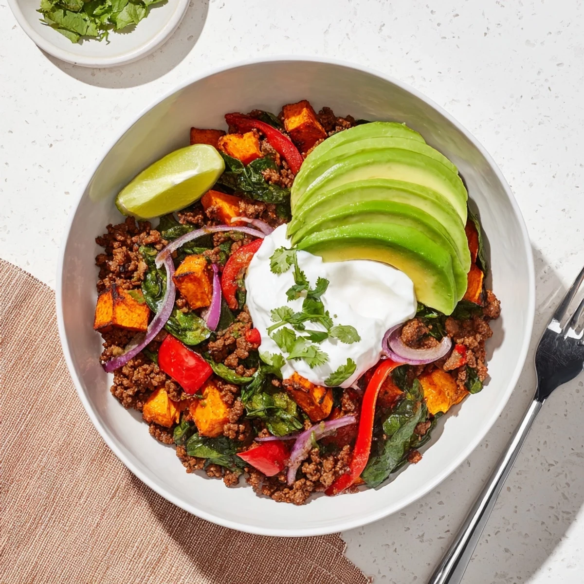 He, I've reviewed your comprehensive recipe for Beef Sweet Potato Bowl. I'll generate 3 unique, SEO-optimized ALT image texts following your specific requirements.