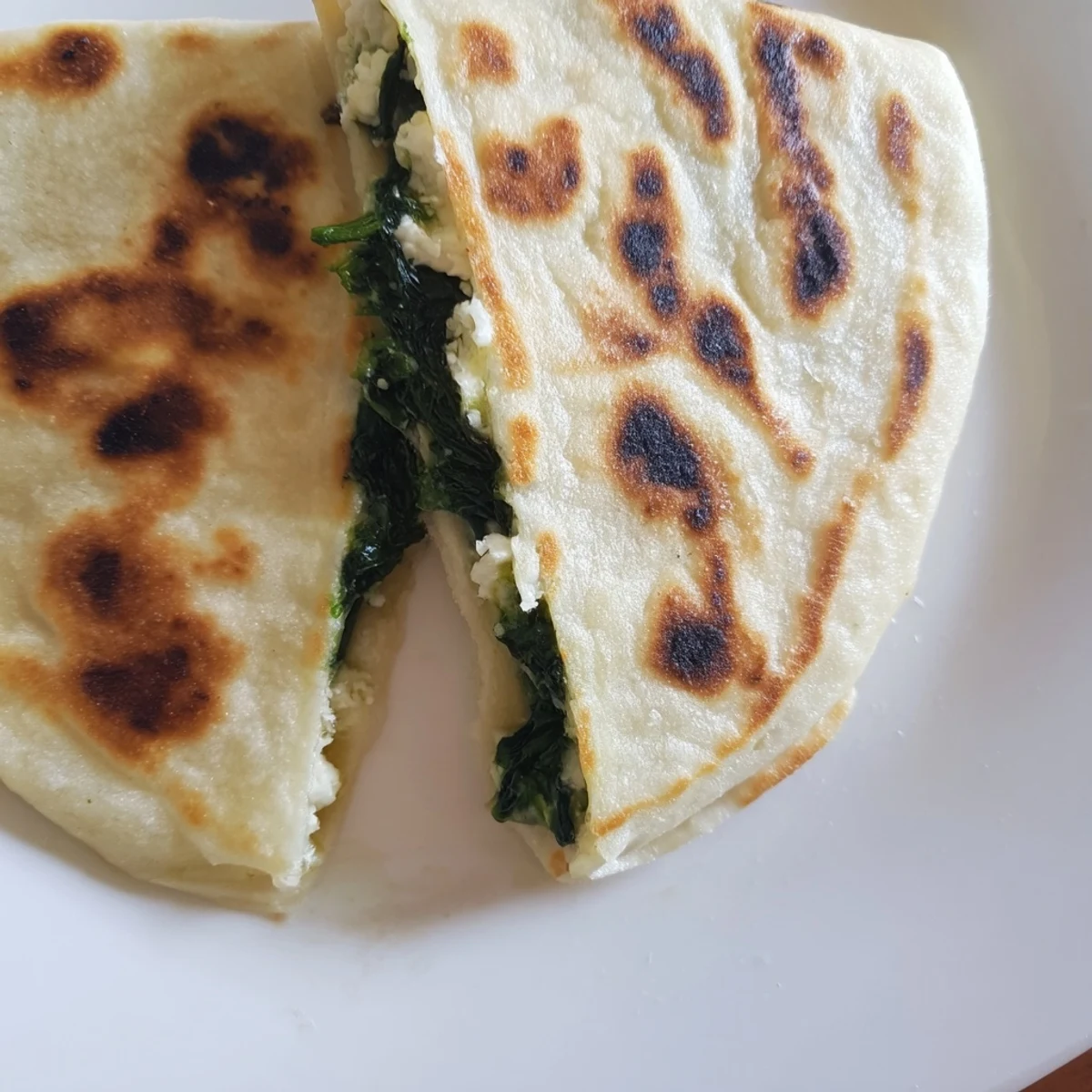Golden brown Turkish Gozleme Spinach Feta flatbread with crispy edges and flaky layers