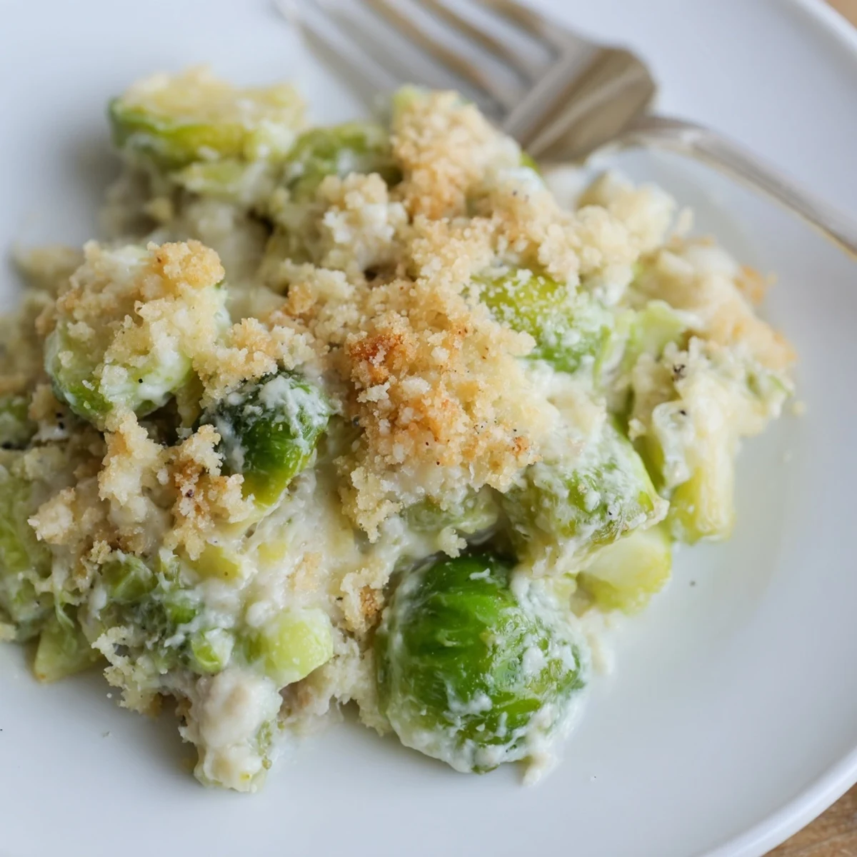 Creamy Parmesan Brussels Sprouts Casserole served warm beside roasted turkey or salad