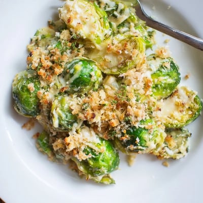 Oven-baked Creamy Parmesan Brussels Sprouts Casserole, tender sprouts in silky cheese sauce